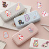 A collection of cute cartoon cat stickers in various colors and styles displayed on a pink background.