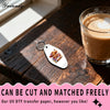A set of 105 Easter Highland Cattle UV DTF transfer stickers displayed on a wooden surface next to a glass of coffee.