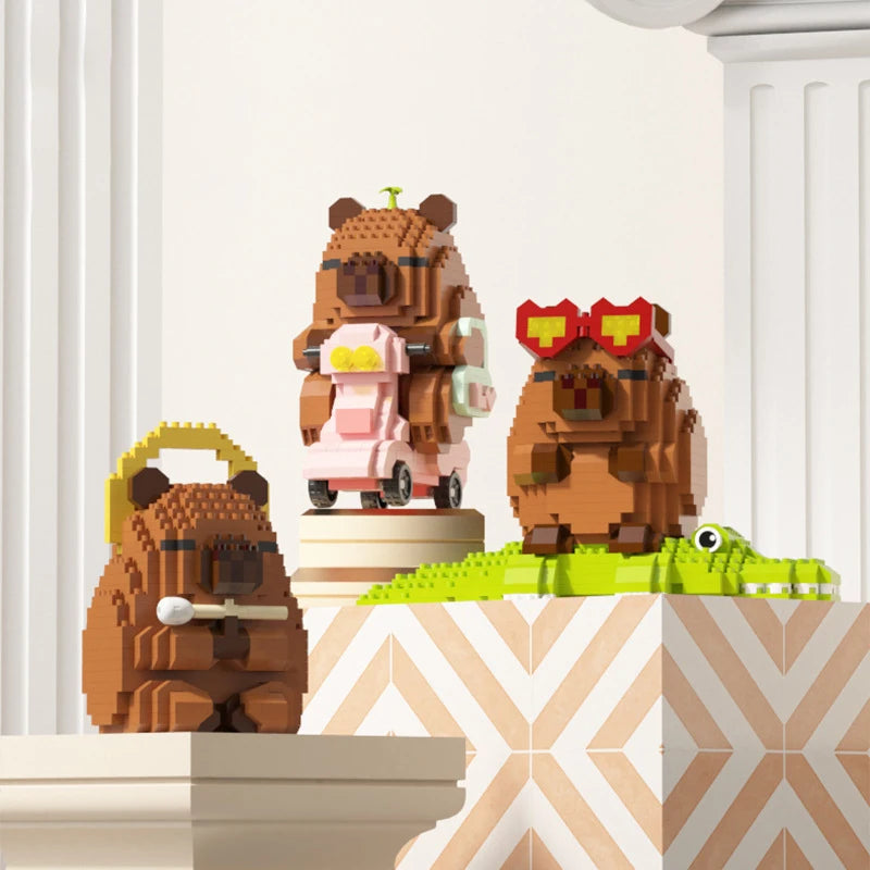 A set of cute capybara micro building blocks featuring a brown bear and a pink capybara.
