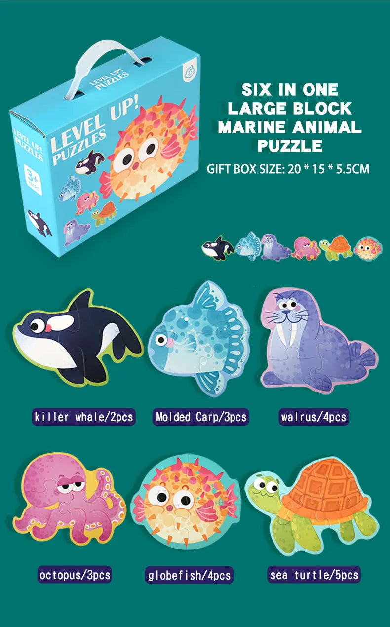 A box of six marine animal puzzles including a killer whale, molded carp, walrus, octopus, globefish, and sea turtle.