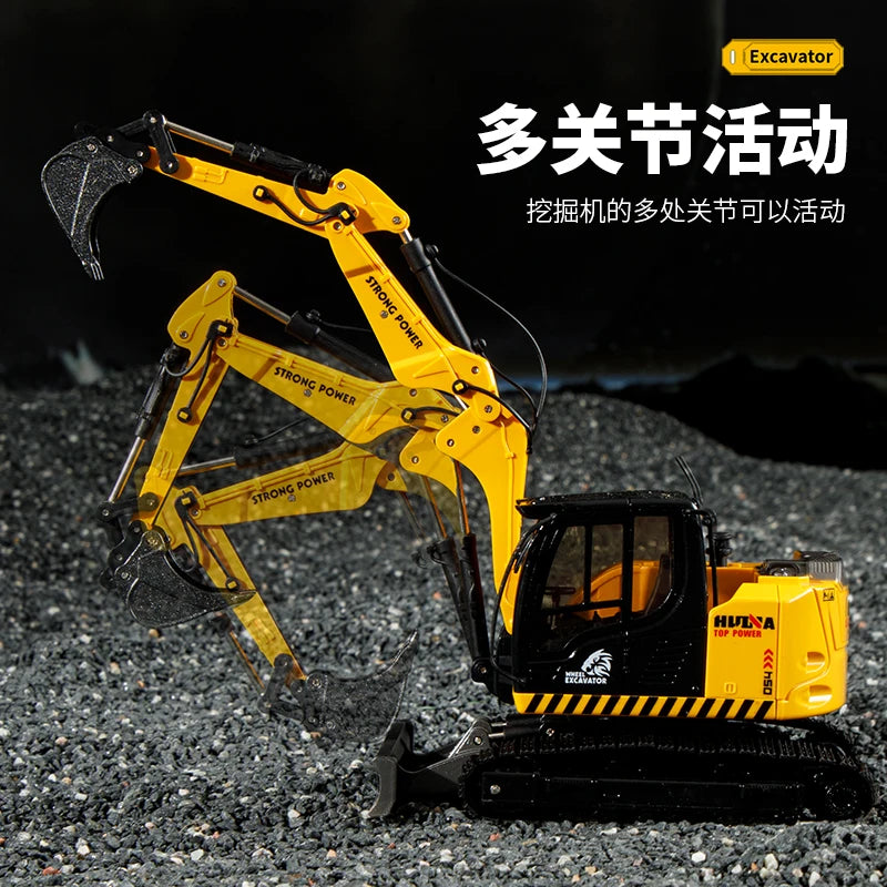 A yellow die-cast toy excavator model is shown operating in a construction environment.