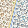 A collection of cute 3D jelly stickers featuring various cat faces in pastel and translucent colors.