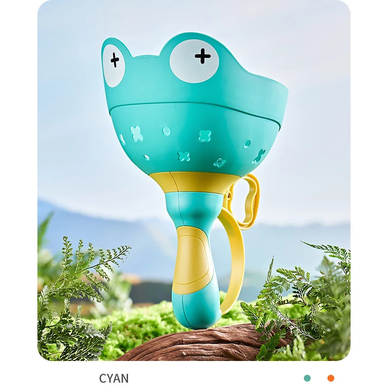 A cyan pull-string flying saucer launcher toy for kids is shown against a natural outdoor background.