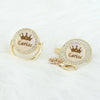 Personalized rose gold crown pacifier and clip set featuring a pearl and diamond design