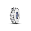 A round sterling silver charm bead featuring a central blue stone surrounded by clear diamond-cut accents.