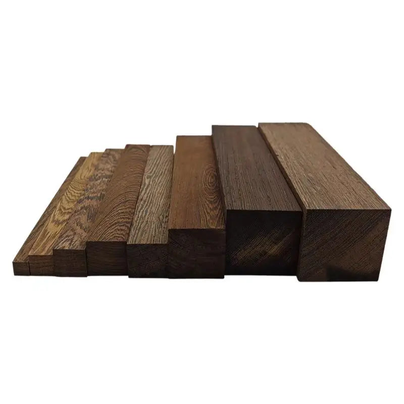 A collection of unfinished natural African wenge hardwood blanks for carving and handle crafting, shown in various thicknesse