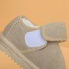A tan leather winter boot for toddlers with a padded ankle and anti-slip rubber sole.