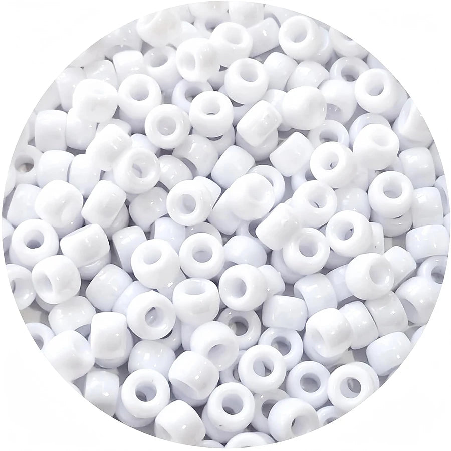 A close-up view of small white pony beads for jewelry, braids, and crafts.