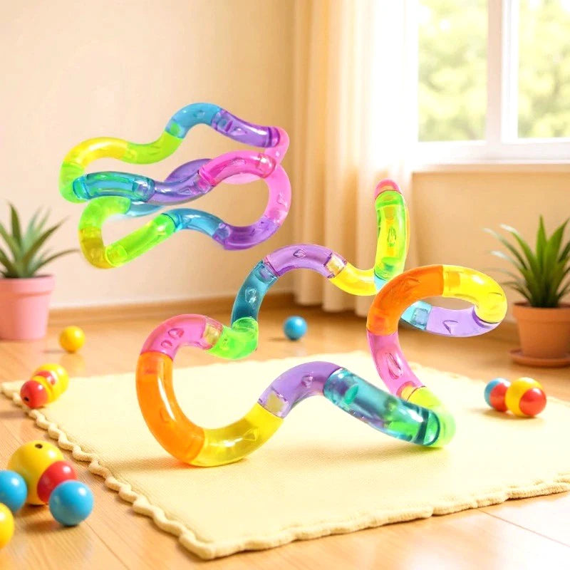 A colorful, flexible rope fidget toy shaped like a snake, featuring translucent silicone in shades of green, purple, and oran