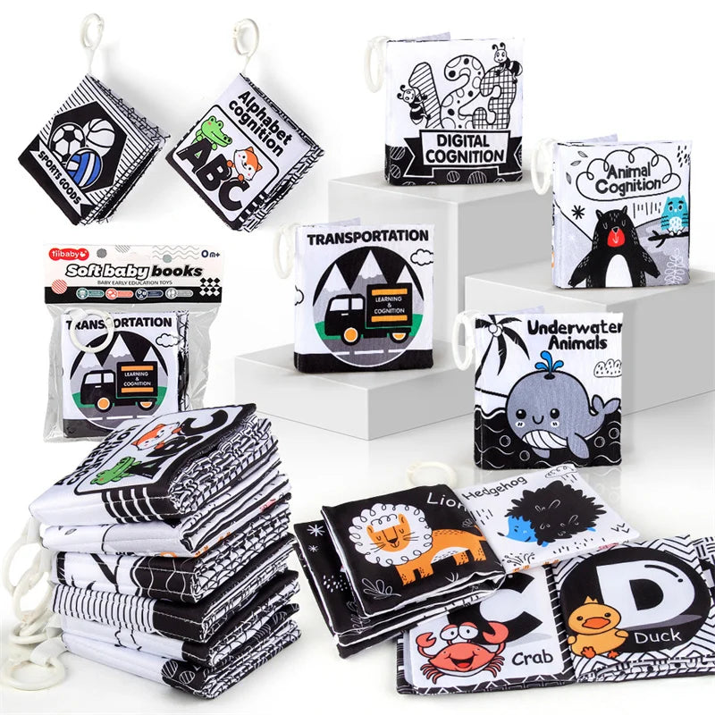 A collection of high-contrast soft baby cloth books featuring letters, animals, and concepts like cognition and transportatio