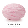Pink chunky chenille yarn ball used for hand knitting projects