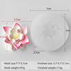 A white silicone mold with a pink multi-flower design and accompanying measurements for crafting.