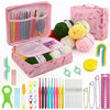 A pink storage box holds a complete 59-piece crochet kit including various colored needles, hooks, and yarn, along with a mat