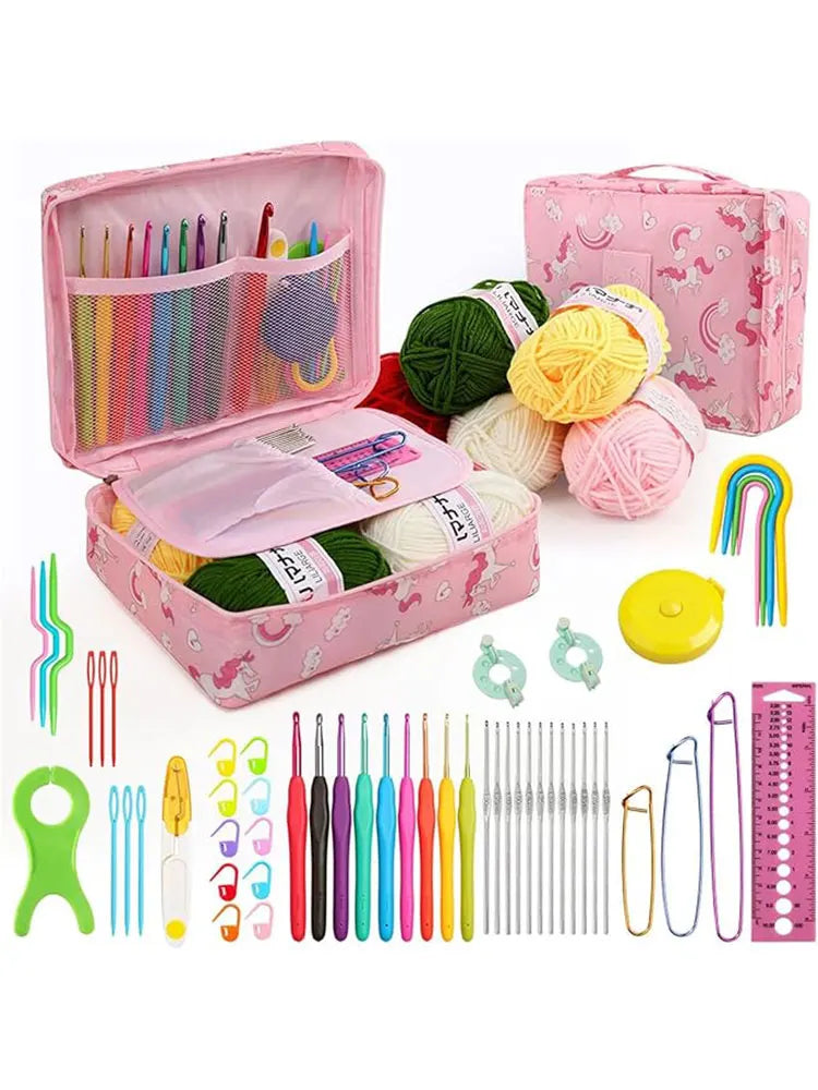 A pink storage box holds a complete 59-piece crochet kit including various colored needles, hooks, and yarn, along with a mat