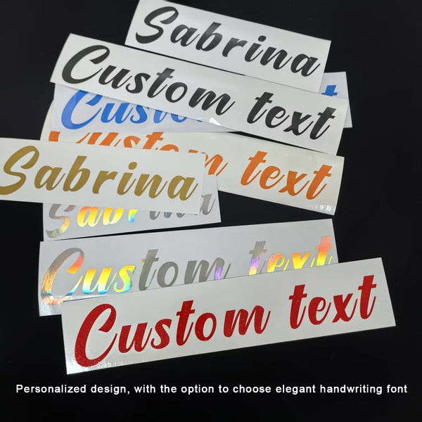 A stack of personalized custom text vinyl name stickers featuring elegant handwriting fonts and holographic finishes.