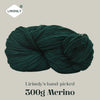 A ball of dark green Merino wool yarn labeled Lirisnly's hand-picked 300g Merino.