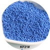 A pile of bright blue 1.5mm solid glass seed beads for jewelry and craft.