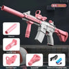 Pink assault rifle replica with a silencer, grip, red dot sight, buttstock, and battery charging cable.