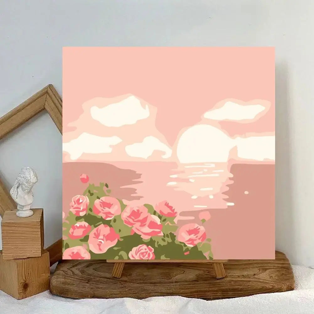 Abstract sunset landscape paint by numbers kit featuring pink and peach tones with a bright sun over the horizon