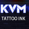 A row of fourteen colored tattoo inks in glass bottles displayed against a dark background.