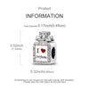 A silver heart charm with the letter I and the word perfume set in a box design