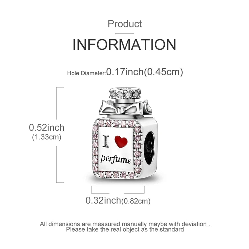 A silver heart charm with the letter I and the word perfume set in a box design