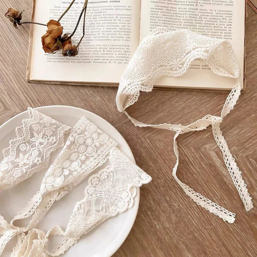 White floral lace baby headband for newborns made of soft cotton stretch