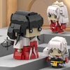A set of anime-inspired collectible building block figures featuring characters with black hair and red clothing.