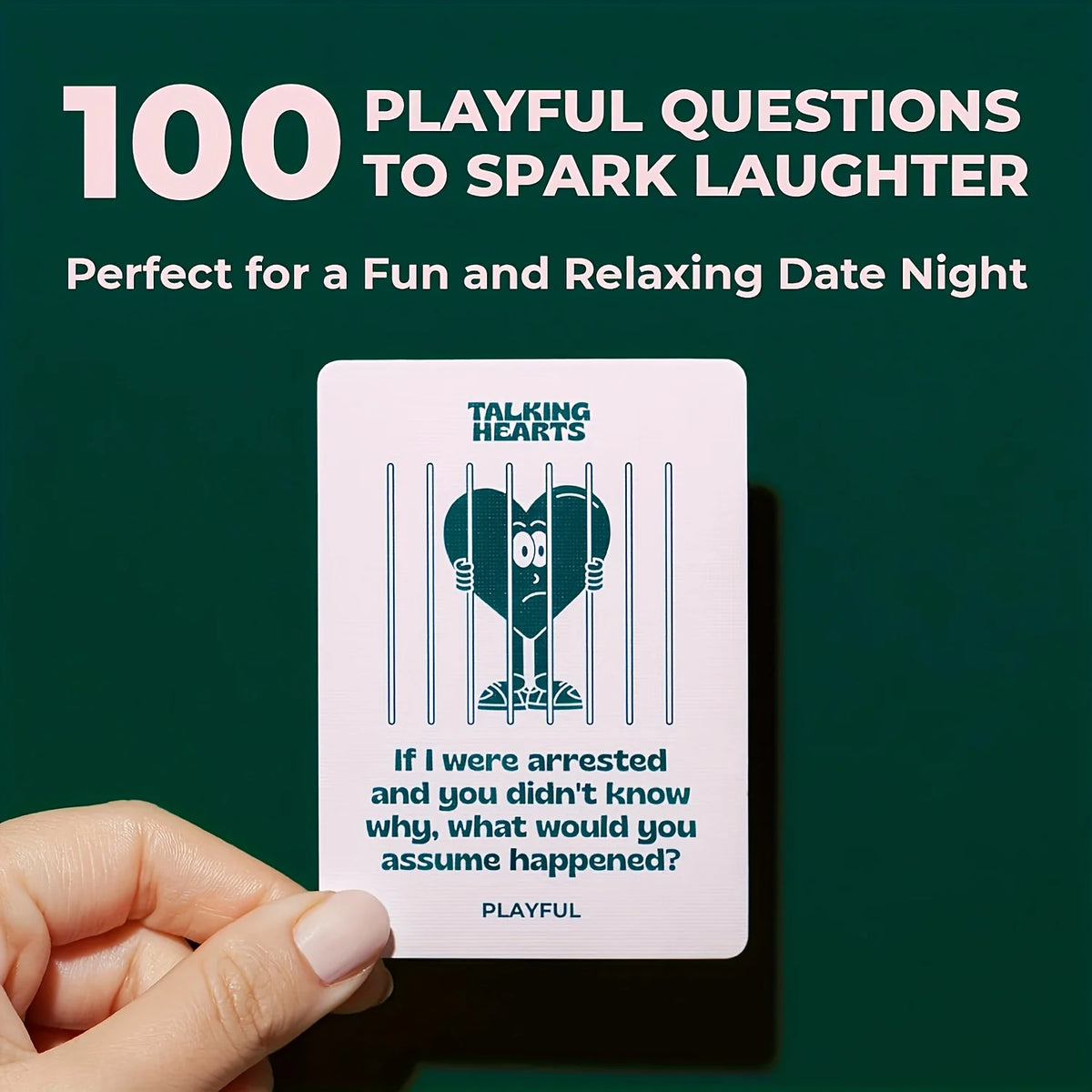 A hand holds a card from the 100 Playful Questions to Spark Laughter set for a fun and relaxing date night.