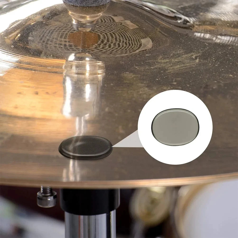 Close-up view of a silicone drum dampening pad mounted on a metallic surface.
