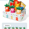 A box of six soft pulling carrot sensory toys with numbered carrots inside.