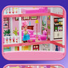 A pink miniature castle and villa playset featuring furniture, decor, and a doll inside a display box.