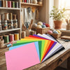 A colorful array of vibrant felt fabric sheets in various shades displayed on a wooden table.