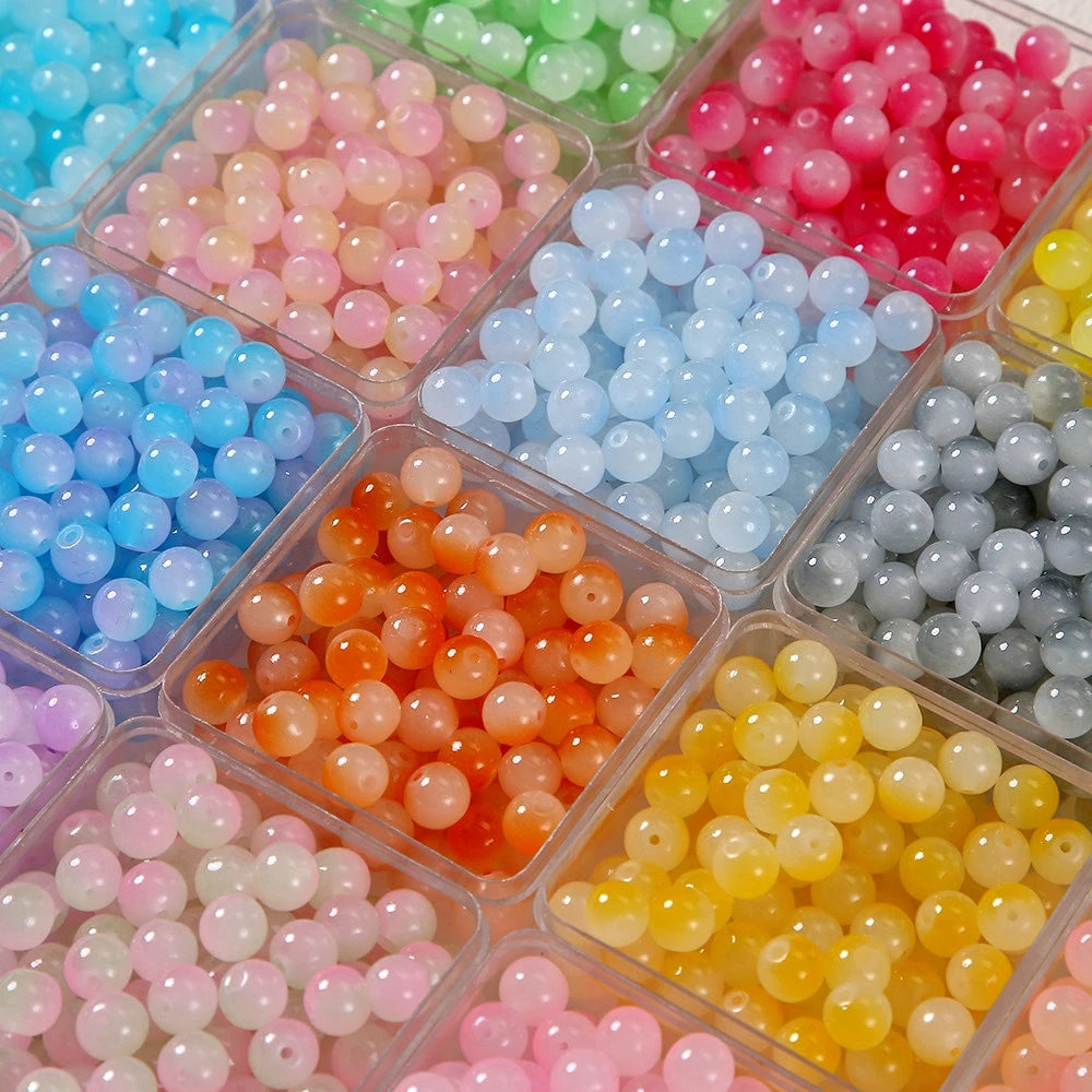 Assortment of colorful 8mm imitation jade glass beads in various shades including pink, blue, green, and yellow.