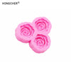 Pink silicone mold shaped like three roses or peonies for resin, jewelry, and baking