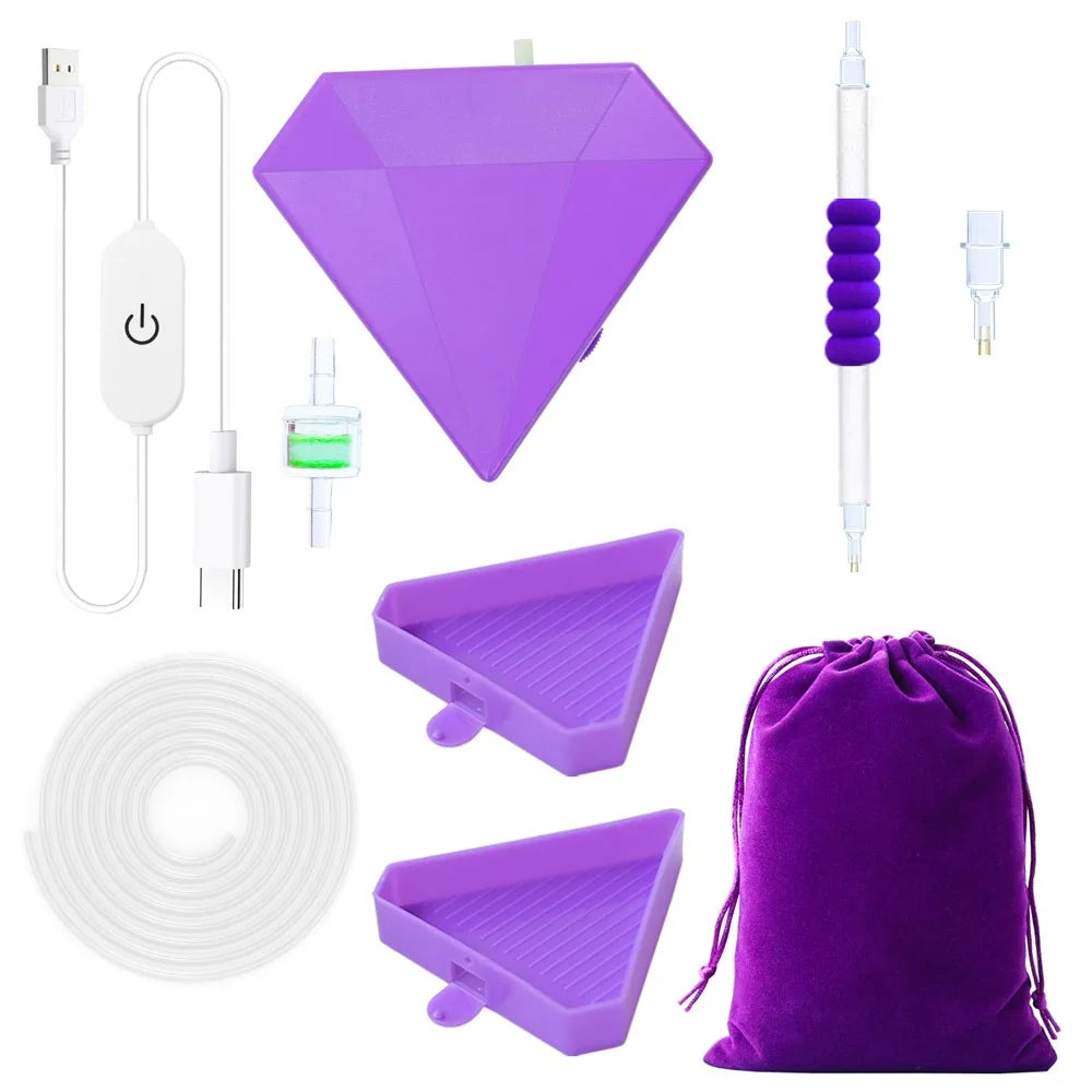 A purple electric diamond painting pen kit with various tools including a suction tool and storage trays.