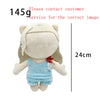 A light blue plush doll resembling a person with blonde hair and a light blue top, shown from the front.