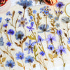 A collection of 50 transparent blue and purple floral stickers printed on parchment paper for journals and crafts.