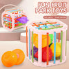 A pink fruit park toy set with colorful plastic fruits inside, designed for food cognition and thought exploration.