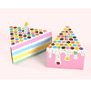 Colorful paper gift boxes decorated with dot shapes and dripping icing, suitable for party favors.