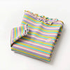A striped cotton t-shirt for girls featuring pastel colors and a rainbow print.