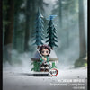 Collectible blind box figures of Tanjiro Kamado Cleaving Stone in a forest setting