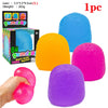 A collection of colorful gumdrop squishy stress balls in various shades including blue, orange, pink, and purple.