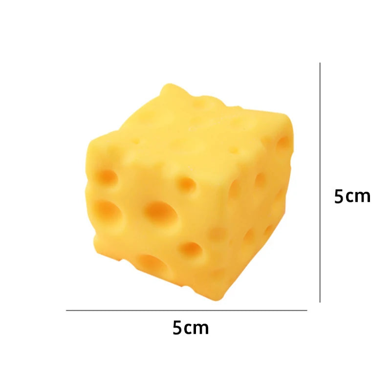 A yellow, cube-shaped cheese squishy fidget toy with visible holes, shown from the top and side.