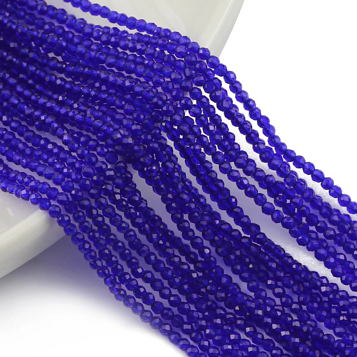 2mm Austrian Crystal Spacer Beads – White AB Finish