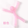 A pink magnetic humanoid toy with a spherical head and limbs.