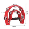 A red double-layer tambourine for kids with a black grip, shown from the side.