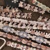 A collection of fabric-textured sticker strips featuring small, cute animal figures in various earthy tones.