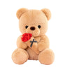 A light brown plush teddy bear with a red rose tied on its chest.