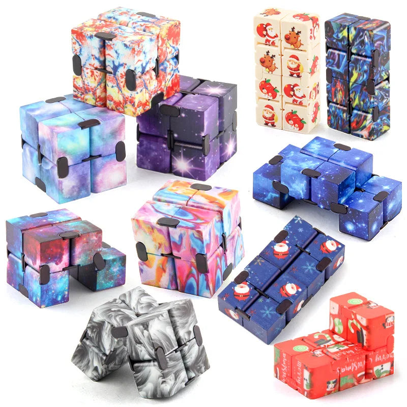 A collection of colorful, translucent fidget cubes in various geometric shapes and colors.